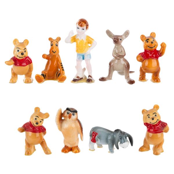 A Set of "Winnie the Pooh" Ceramic Figurines.