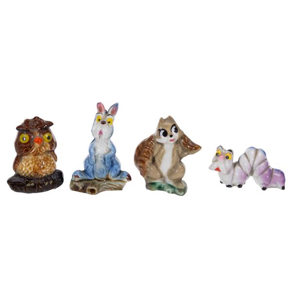 A Collection of "The Sword in the Stone" Ceramic Figurines.
