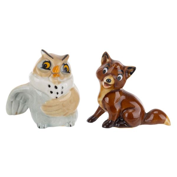 A Pair of "Fox and the Hound" Ceramic Figurines.