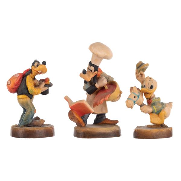 Three Miniature Goofy and Donald Figurines by ANRI.