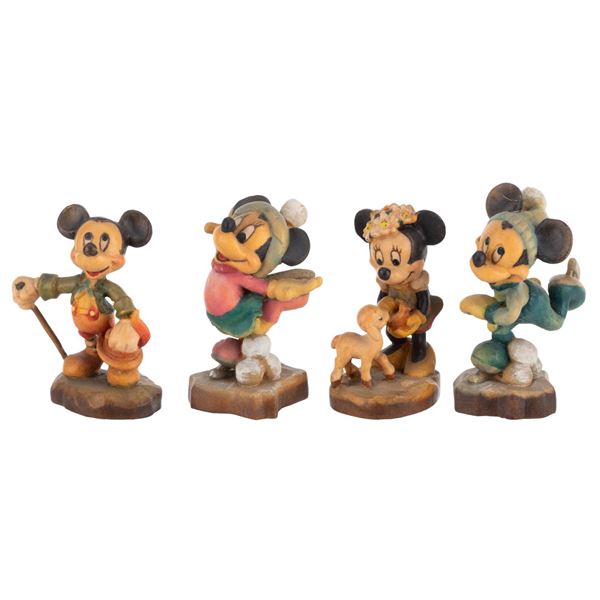 A Set of Four Miniature Mickey and Minnie Figurines by ANRI.