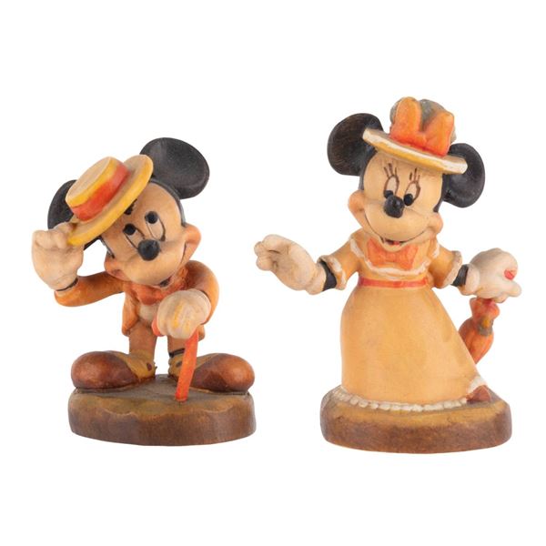 A Pair of Mickey and Minnie Mouse Figurines.
