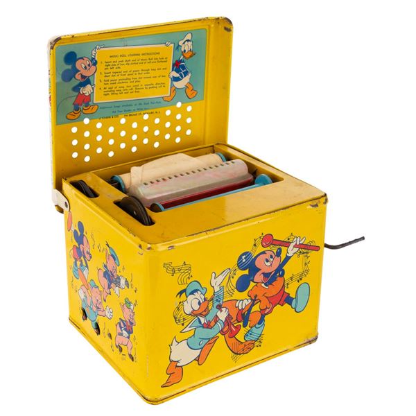 A Disneyland Tin Litho Melody Player.