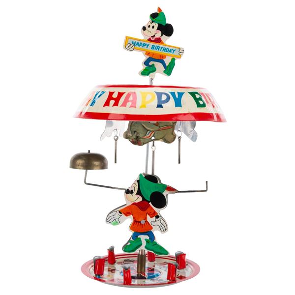 A Disneyland Tin Cake Topper Carousel with Box.