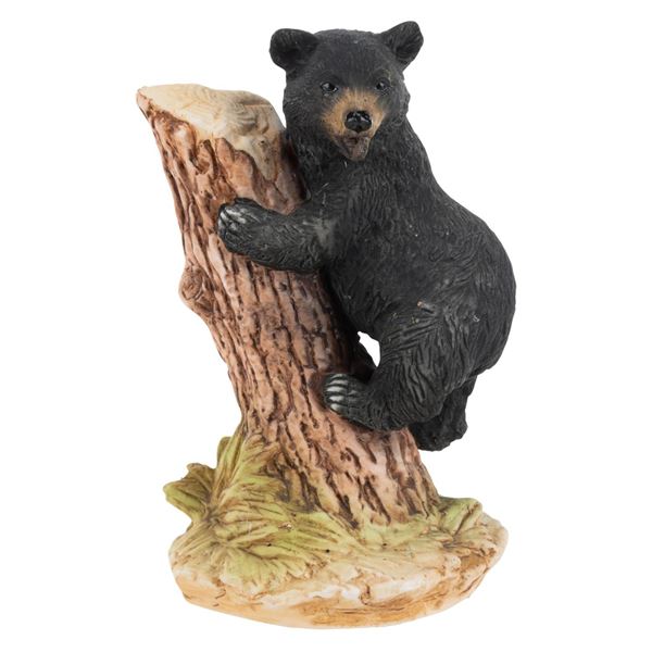 A Disneyland Souvenir Bear Figurine.
