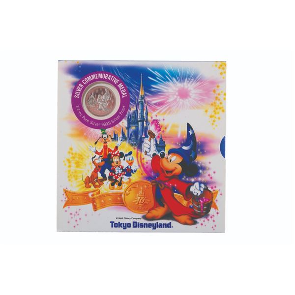 A Tokyo Disneyland 10th Anniversary Silver Coin.