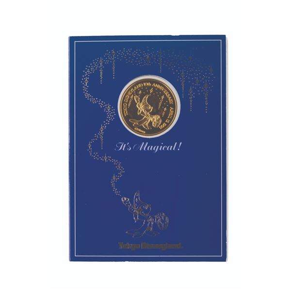 A Tokyo Disneyland 10th Anniversary Gold Coin.