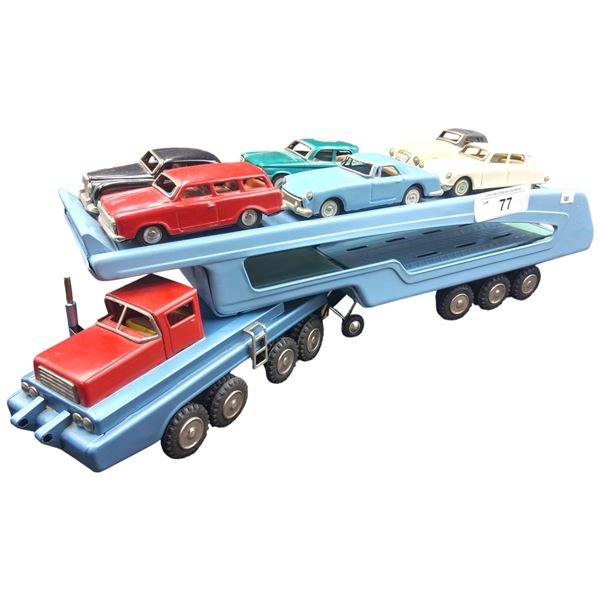 Vintage 60s tin toy car hauler with nice assortment of tin cars 22"