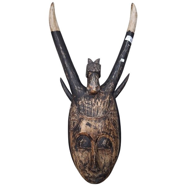 Large wooden mask with horns, 37" tall