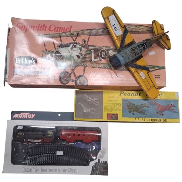 3 plane model kits and tin plane