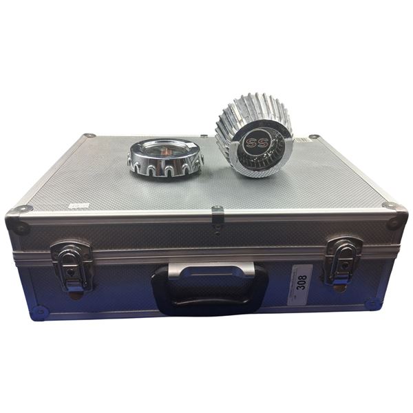 Aluminum carrying case and two vintage centre caps