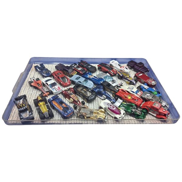 Approx 30 die cast cars in case