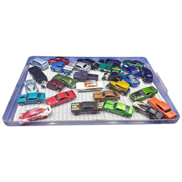 Approx 30 vintage die cast cars in case