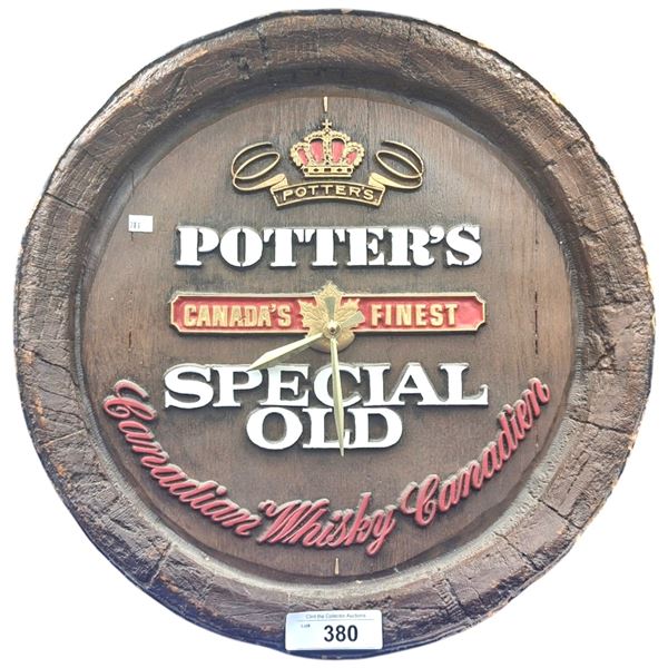 Vintage Potter's Whisky clock 18" dia, works