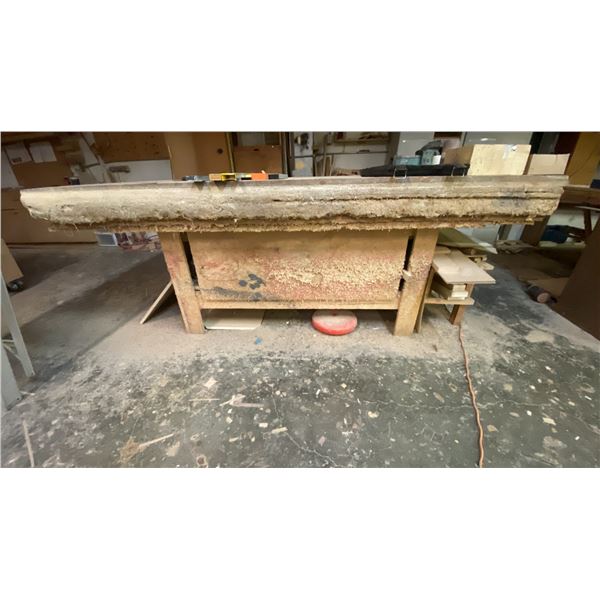 WOODEN SHOP TABLE WITH ASSORTED WOOD PIECES APPROX 97"L X 50"D X 39"H *CONTENTS ON TOP OF TABLE NOT