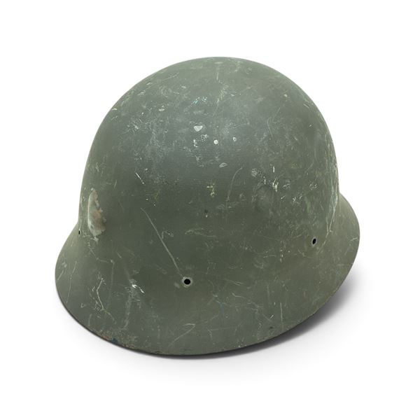 Japanese Helmet with a Bullet Hole