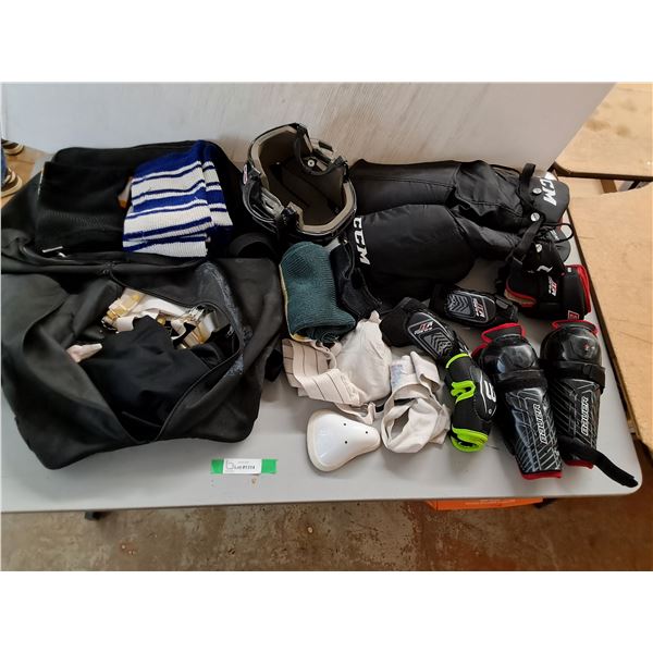 Assortment of Junior Hockey Equipment w/ bag