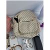 Image 5 : Gucci Cap, Jewelry, Instant Cold Compress, Tumbler, Mini Backpack, Body Spray & Leave In Conditioner