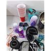 Image 6 : Self Care Products, Stock Pot, Single Use Cups, Headphones, Charging Cables, Bluetooth Speaker, Misc