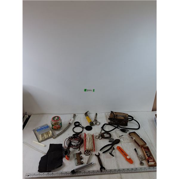 Assorted Industrial Items, Black and Decker Jig Saw Powers On, Pliers, Shears, Safety Goggles, Glue