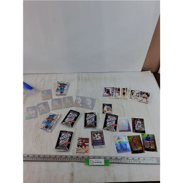 Assorted Hockey Cards and NHL 1990-91 Card Packs Opened