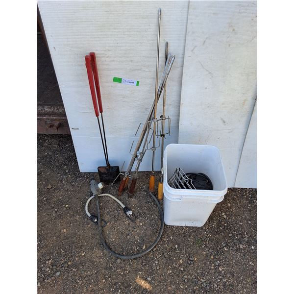 **(5) Fire Roasting Skewers, Bungee Cord, (2) Small Metal Baskets, Pickup Only