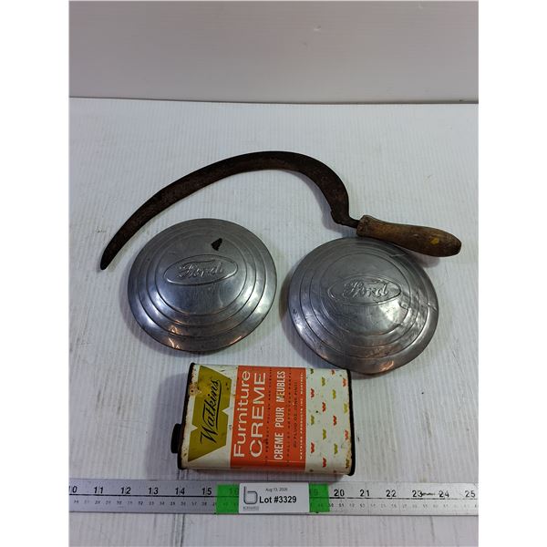 Hand Sickle, (2) Ford Hubcaps, Watkins Furniture Creme Tin