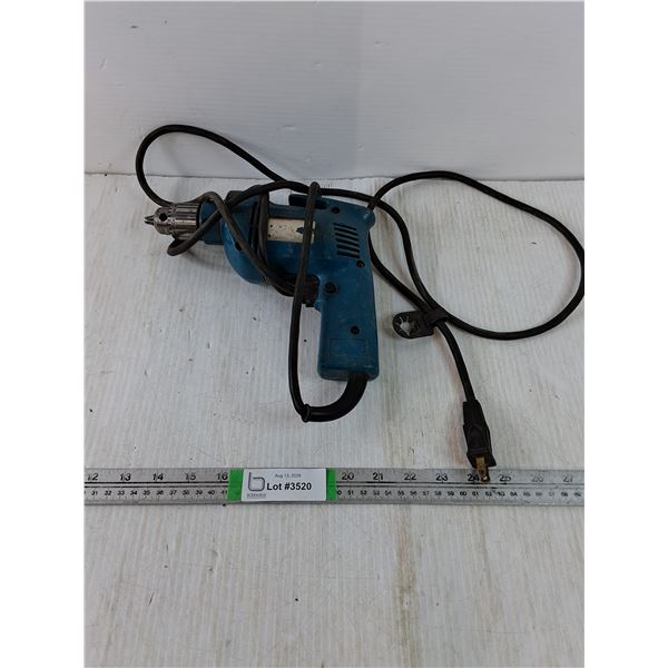 (1) Makita Corded Drill-powers on