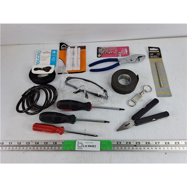 One Wrap Thin Ties, Bicycle Lock, Screwdrivers, Pliers, Safety Glasses, Drill Bit, Misc