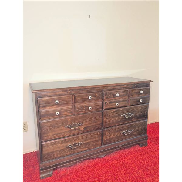 Wooden Dresser with Eight Drawers and Mixed Drawer Pulls