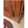 Image 5 : Wood-Look Laminate Rolling Cabinet, Brown Fabric Ottoman, and Oval Braided Rug