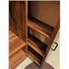 Image 6 : Wood-Look Laminate Rolling Cabinet, Brown Fabric Ottoman, and Oval Braided Rug