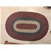 Image 7 : Wood-Look Laminate Rolling Cabinet, Brown Fabric Ottoman, and Oval Braided Rug