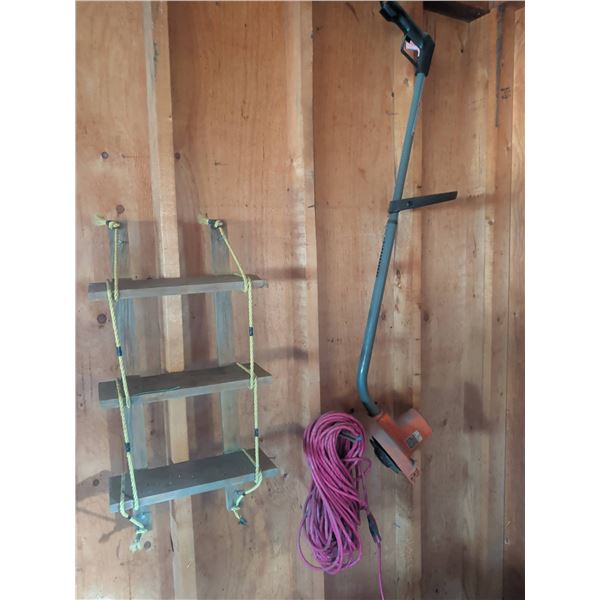 Electric String Trimmer with Extension Cord and Hanging Wood Shelf