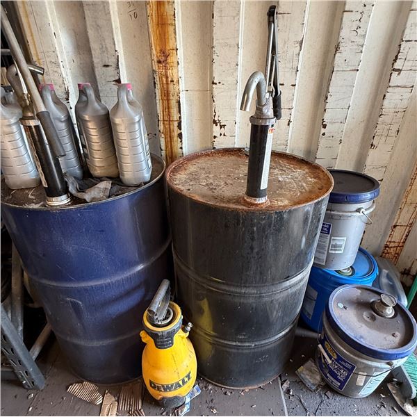 Qty 2 55-Gallon Drums w/ Manual Pumps, Antifreeze Bottles, Buckets Hydraulic Oil, etc
