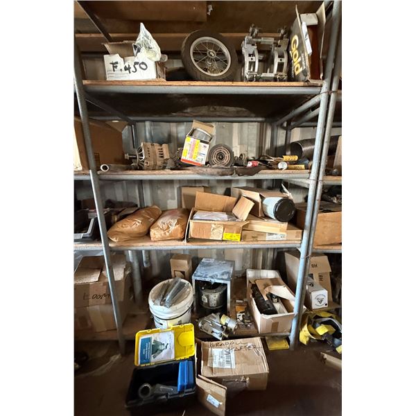 Contents of Shelf: Wheels, Gradall Starter, Jisan Hydraulic Breaker, PennBarry Fan, Garnet Abrasive,