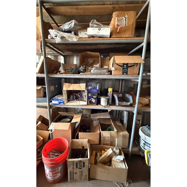 Contents of Shelf:  Cat Parts, Trencher Bucket Tooth, Radnor Hose, Filters, Napa Brake Pads, Starter