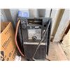 Image 3 : Multiple Pipe Fittings, Truck Pac Jump Starter w/ Cables, Chain Saw, Filters, Hose Reel, Chisel Set,