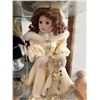 Image 1 : Porcelain Doll in Cream and Gold Dress