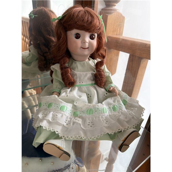 Porcelain Doll with Green Dress and Red Hair