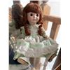 Image 1 : Porcelain Doll with Green Dress and Red Hair