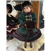 Image 1 : Porcelain Doll in Green Winter Coat