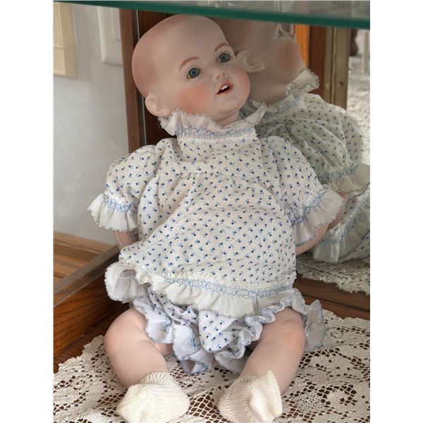 Porcelain Baby Doll with Blue Floral Dress