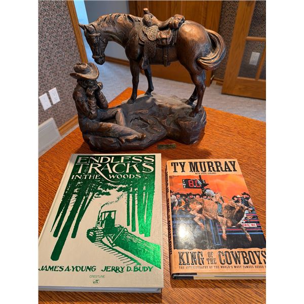 Canadian Cowboy Statue with Two Books