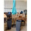 Image 1 : Teal Patio Umbrella With Two Black Planters