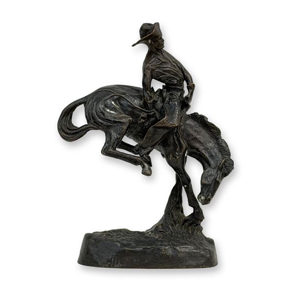 After Frederic Remington (American 1861-1909) Bronze Patinated Sculpture, The Outlaw, Signed