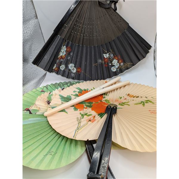 Three Asian Hand Fans and a Glove Stretcher