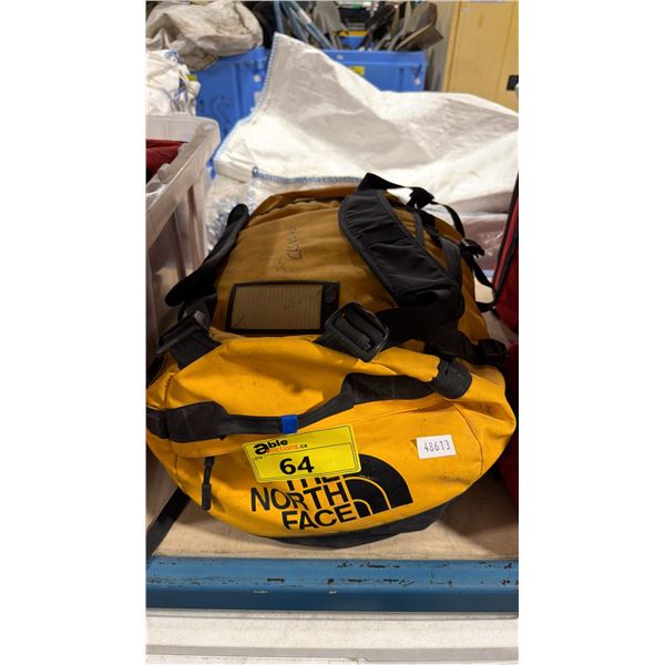 THE NORTH FACE COMMERCIAL BACKCOUNTRY EMERGENCY RESPONSE KIT IN ORANGE DUFFEL STYLE DRY BAG