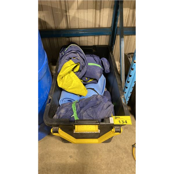 BLACK PLASTIC BIN OF ASSORTED BED ROLLS, COVERALLS, & DRY SUITS *BIN INCLUDED*