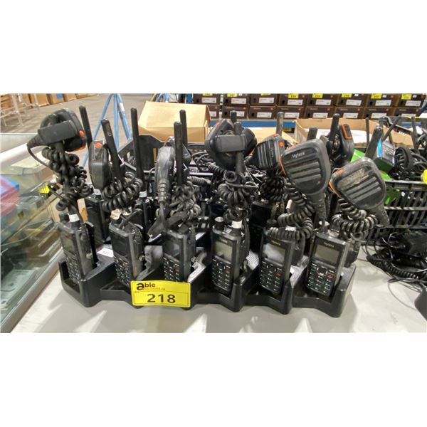 2 HYTERA 6 BAY CHARGE STATION WITH 12 HANDHELD RADIOS WITH REMOTE SPEAKERS, BATTERIES, BELT CLIPS, &